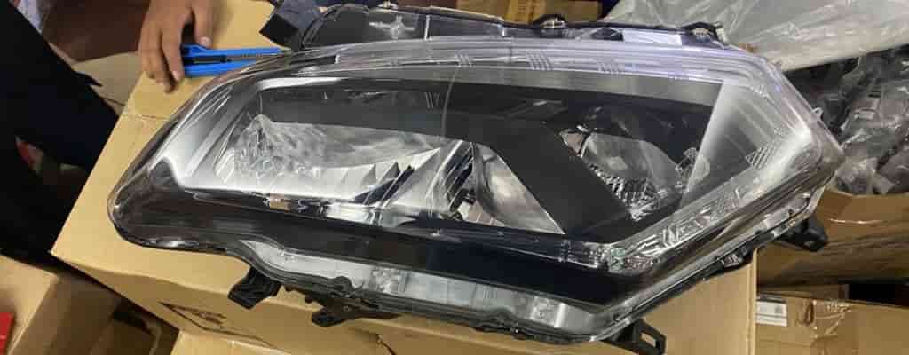 đèn pha nissan x-trail 2016 bóng halogen