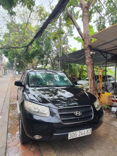 Chính chủ bán xe SANTAFE đăng ký 2009  máy  xăng 12 lít /100km, số tay